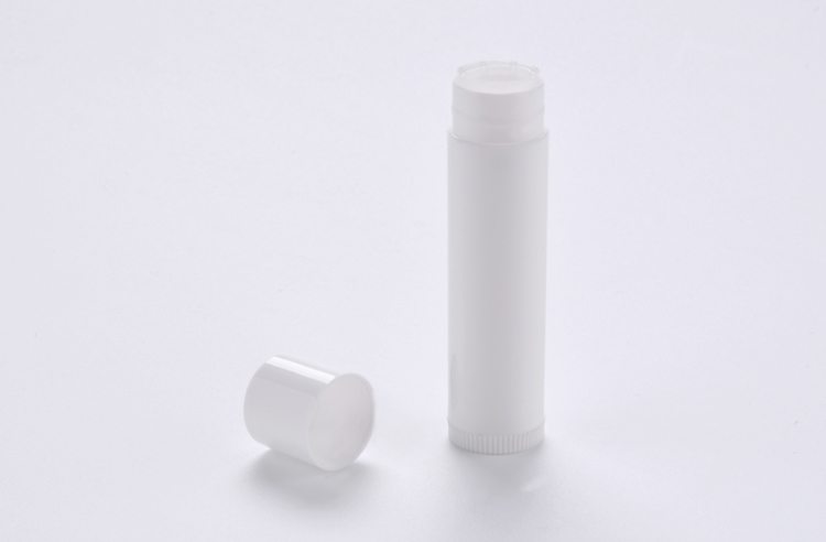 empty plastic lip balm container