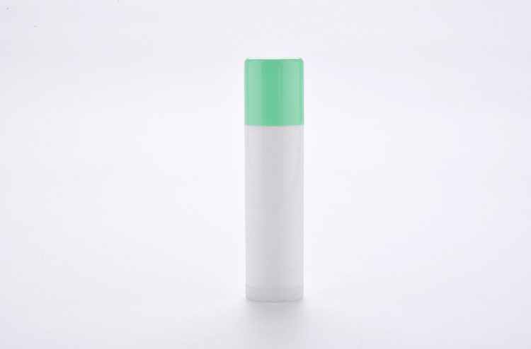 white plastic lip balm tube