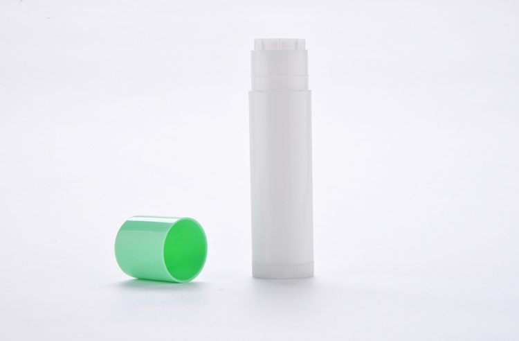 white plastic lip balm tube