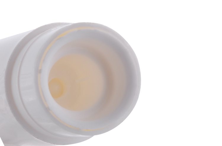 white plastic lip balm tube