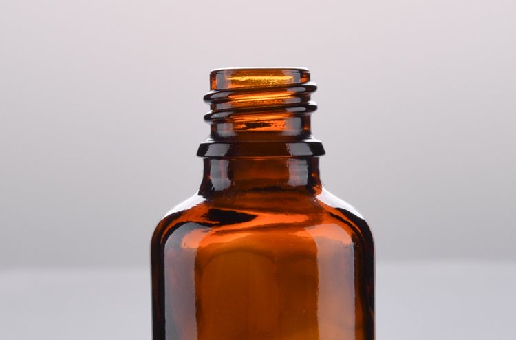 amber essential oil glass bottle